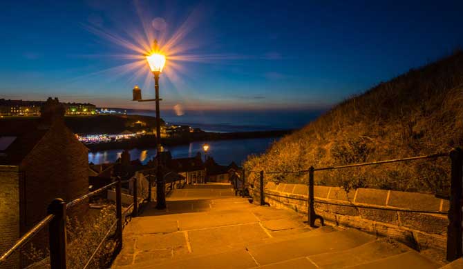 The famous 199 steps at Whitby seen by night.