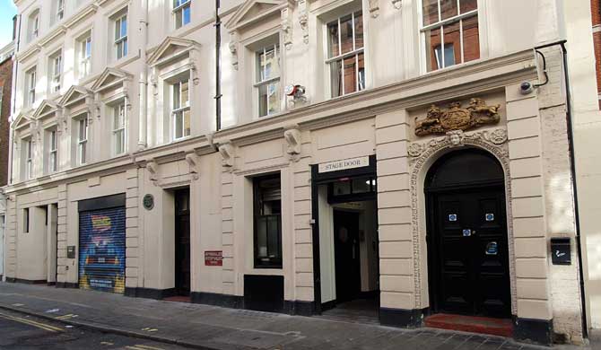 The stage door of the Adelphi Theatre.