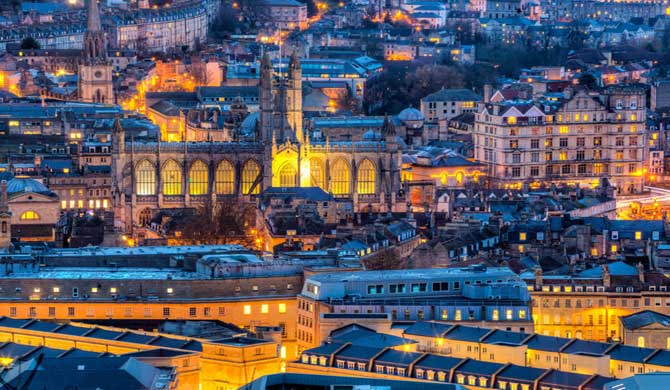 An arial view of Bath and the Abbey by night.