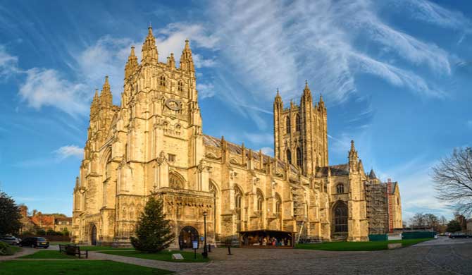 A view of Canterbury Cathedral at sunset.