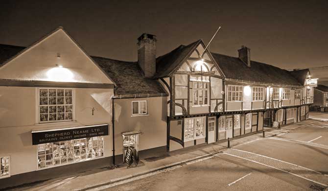 The Ostrich Inn by night.